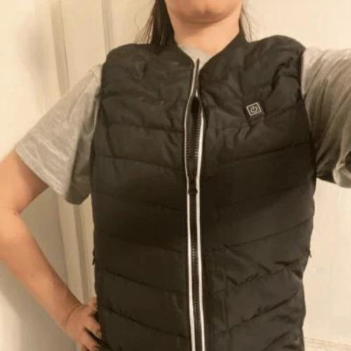 lady tries on Flamevest Jacket